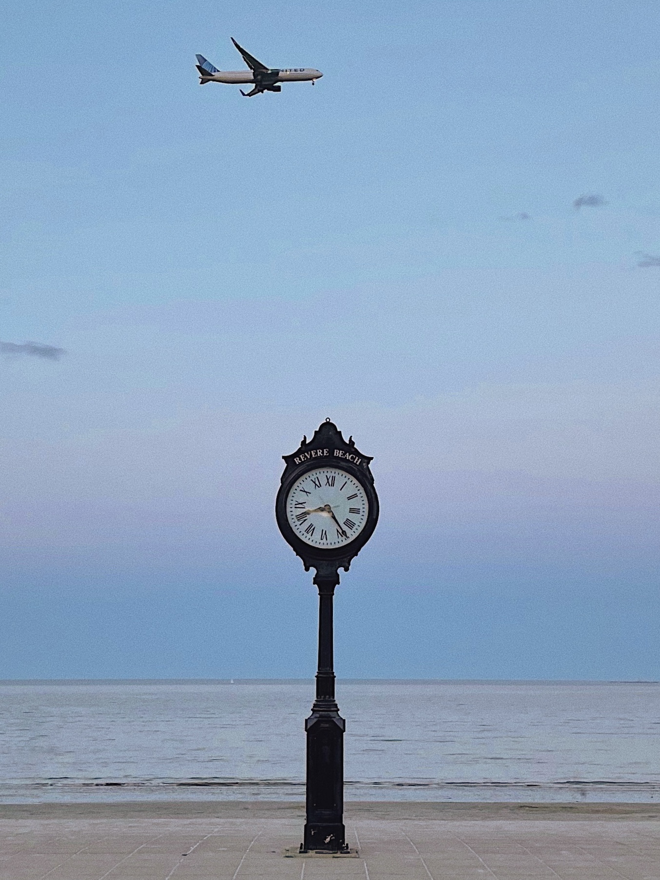 The clock in Revere Beach, Boston, with blue sky